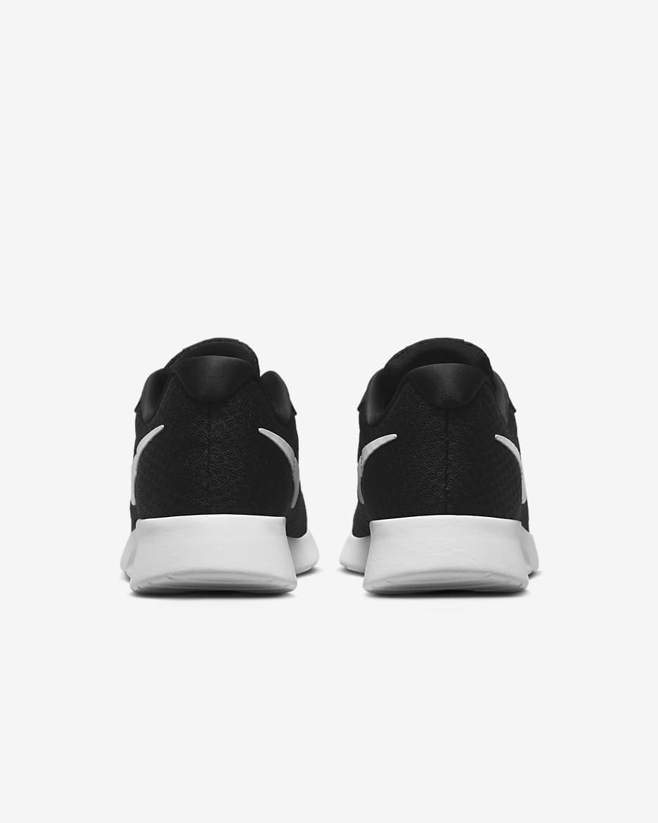 Black nike tanjun trainers womens best sale